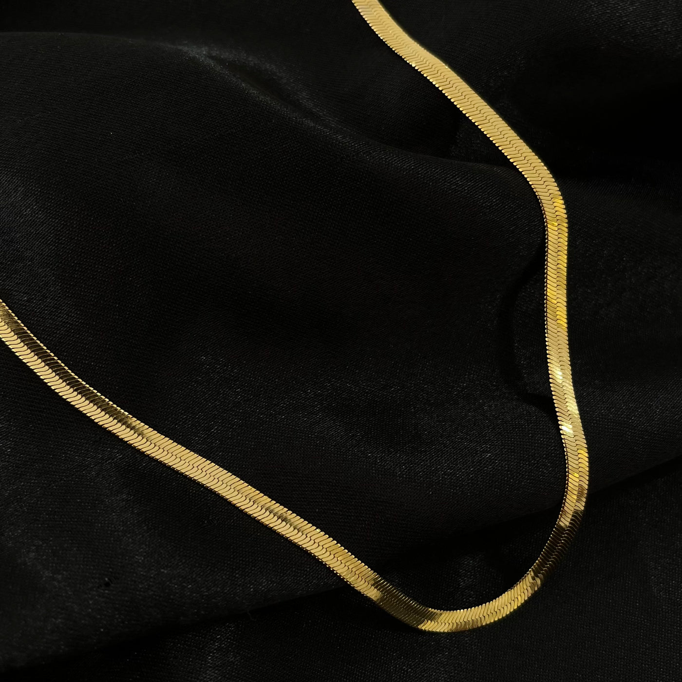 Cadena Fiorella planchada de oro laminado de 18 K.