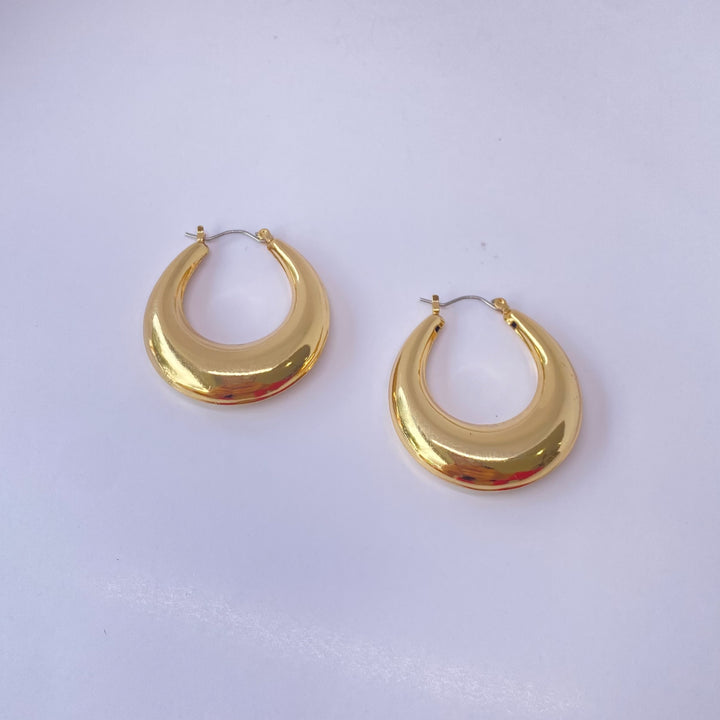Arracadas Daniela chunky ovaladas con chapa de oro 18K - AMATINA Joyería